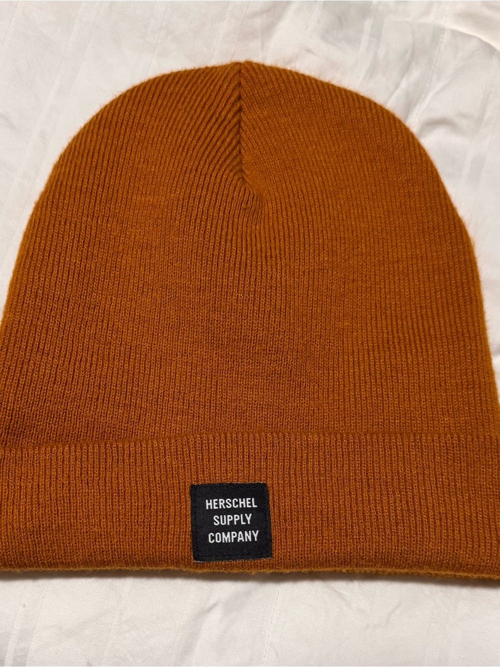 HERSCHEL SUPPLY COMPANY ABBOTT PUMPKIN SPICE BEANIE
Men’s one size